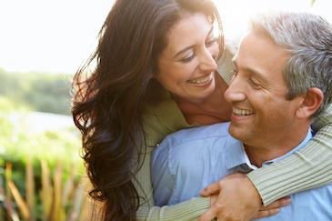 couple hugging | cosmetic dentistry scarborough