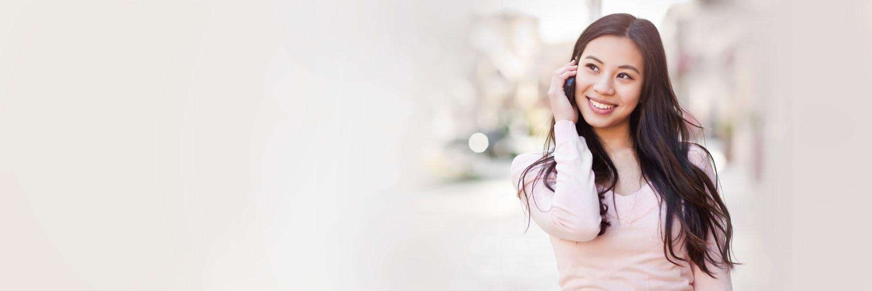 woman on the phone | cosmetic dentist scarborough